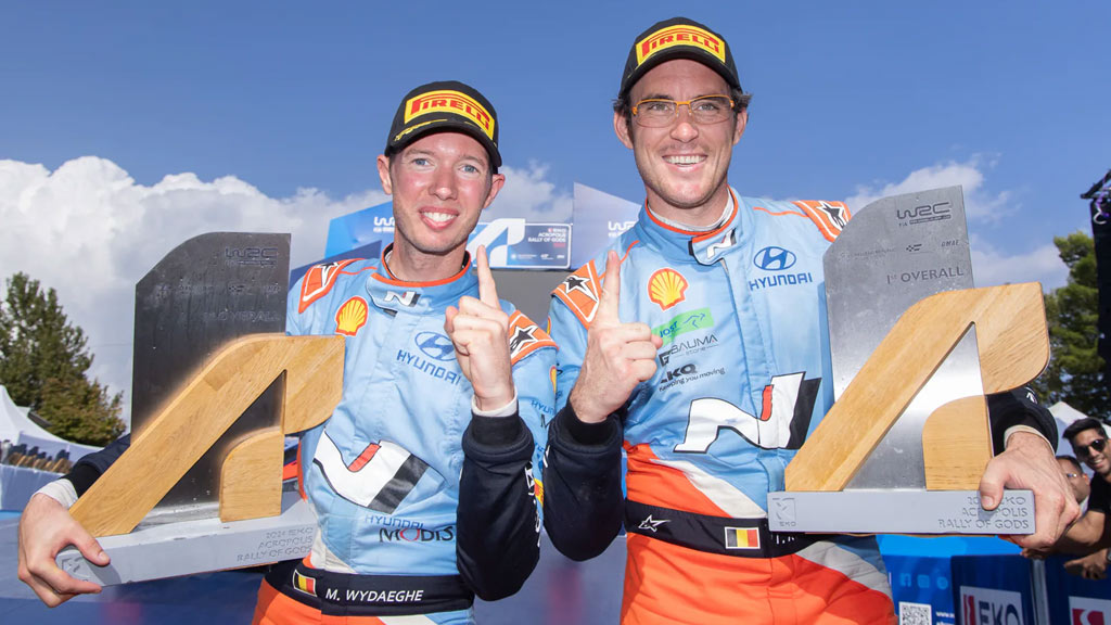 Neuville y Wydaeghe celebrando 