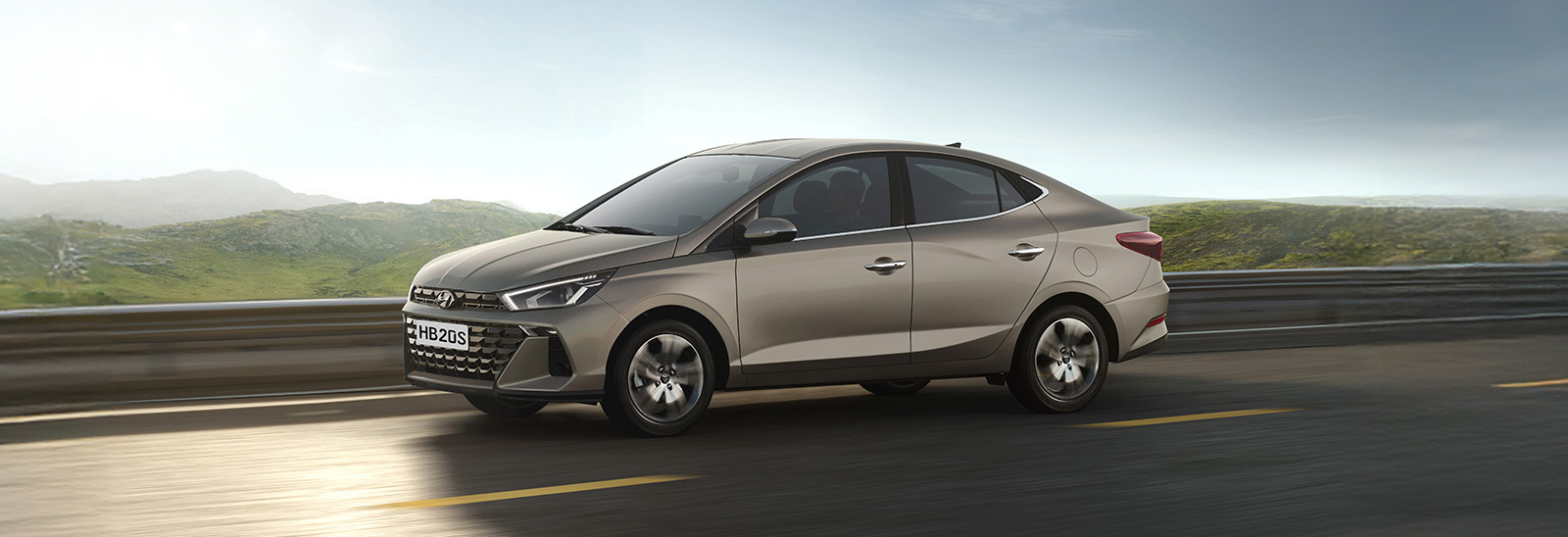 Mesa en respaldo de asiento delantero con una tableta y termo en portavasos individial marca Hyundai